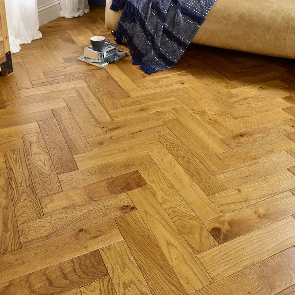 Classic oak herringbone engineered wood flooring with a warm, textured finish