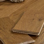 Close-up of interlocking oak floor plank edges