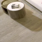 Close-up of light oak wood planks and coffee table