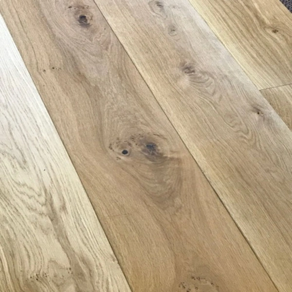 Close-up of wide plank engineered oak flooring with natural wood grain