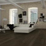 Industrial loft with dark wood floors and brick walls