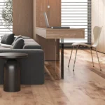 Minimalist home office with natural wood floors.