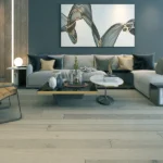Modern living room with grey sofa and oak floors