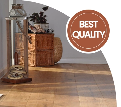 Smooth light oak wood flooring in a bright room.