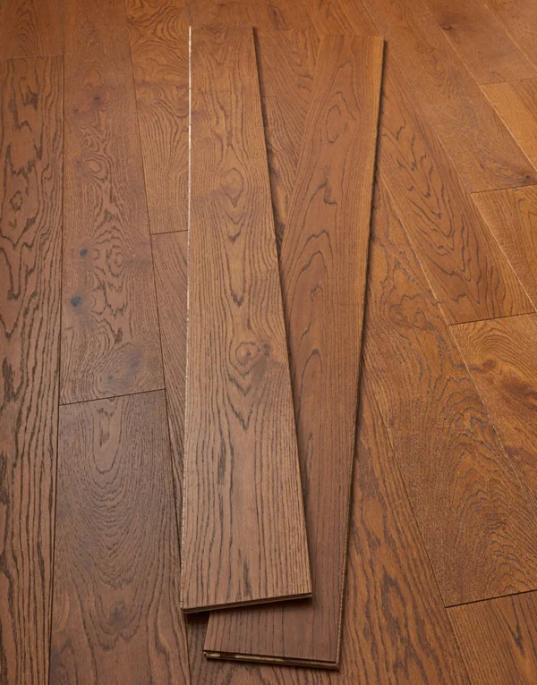 Warm oak hardwood flooring in a modern hallway.